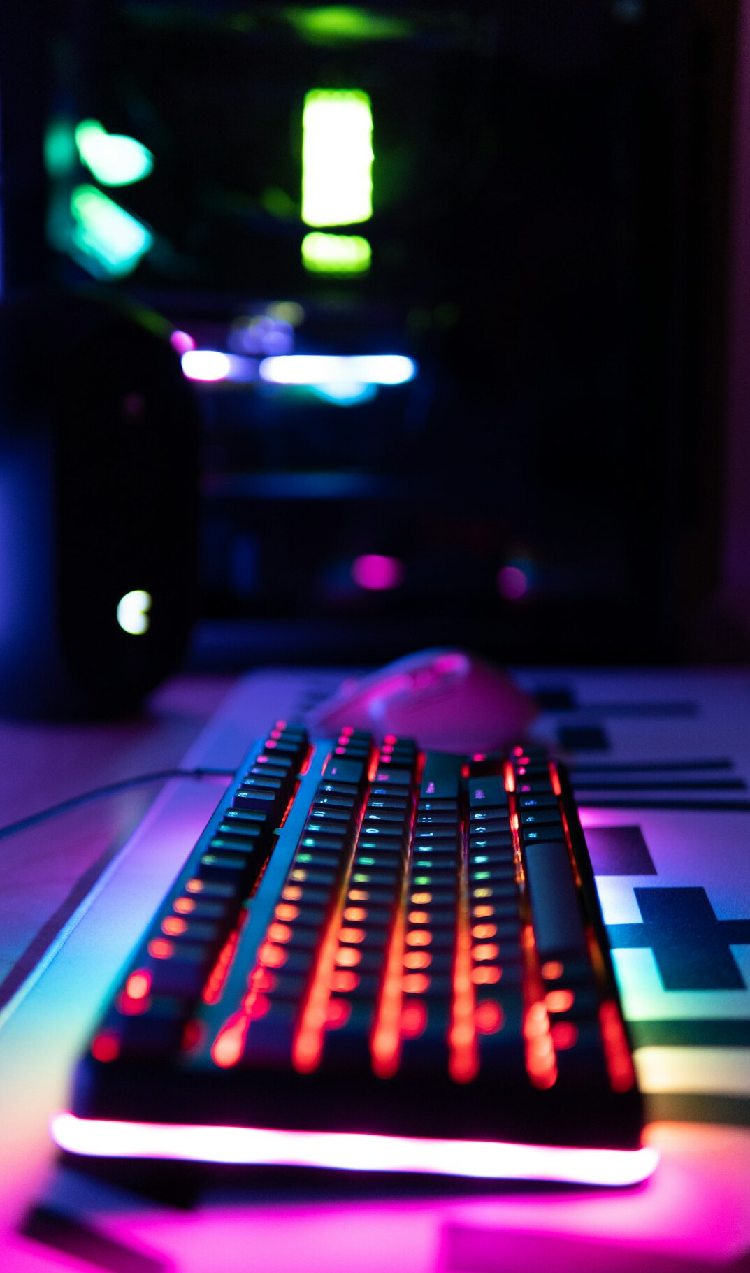 Close-up of a mechanical keyboard with colorful backlighting