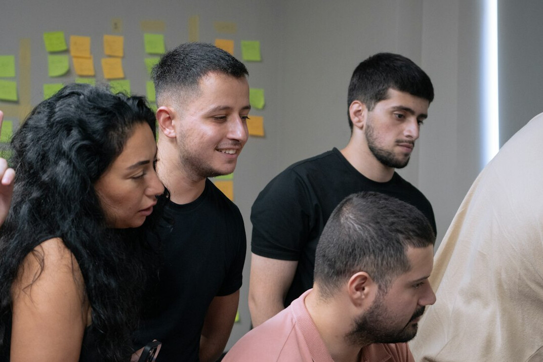 diverse team discussing code