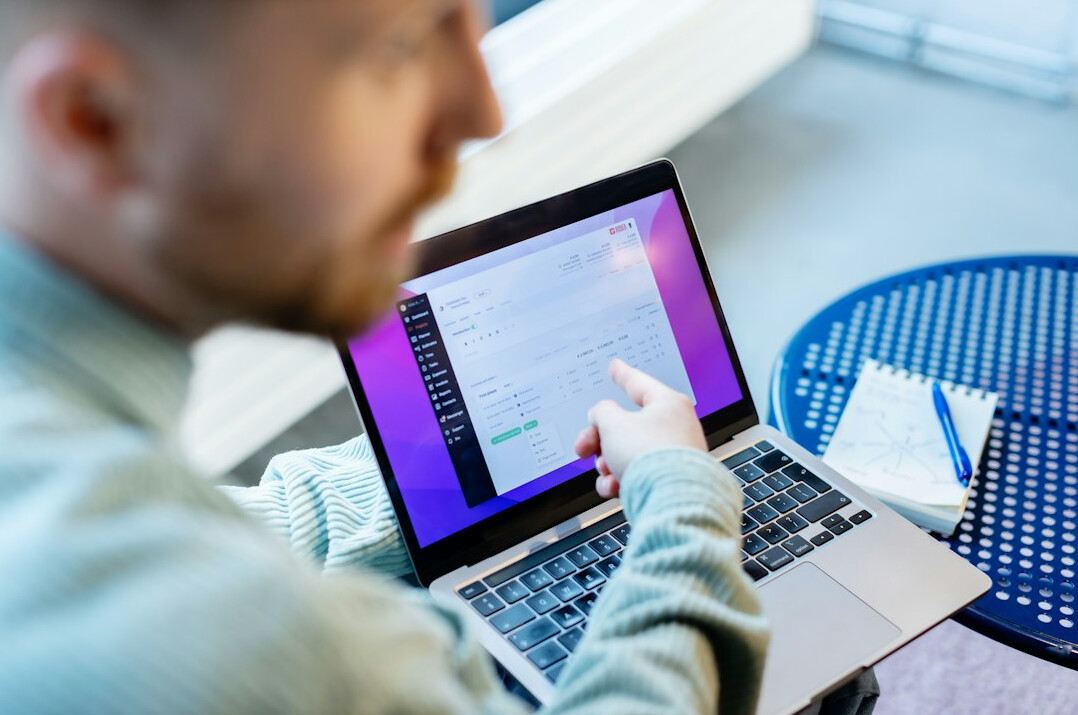 person learning coding on laptop